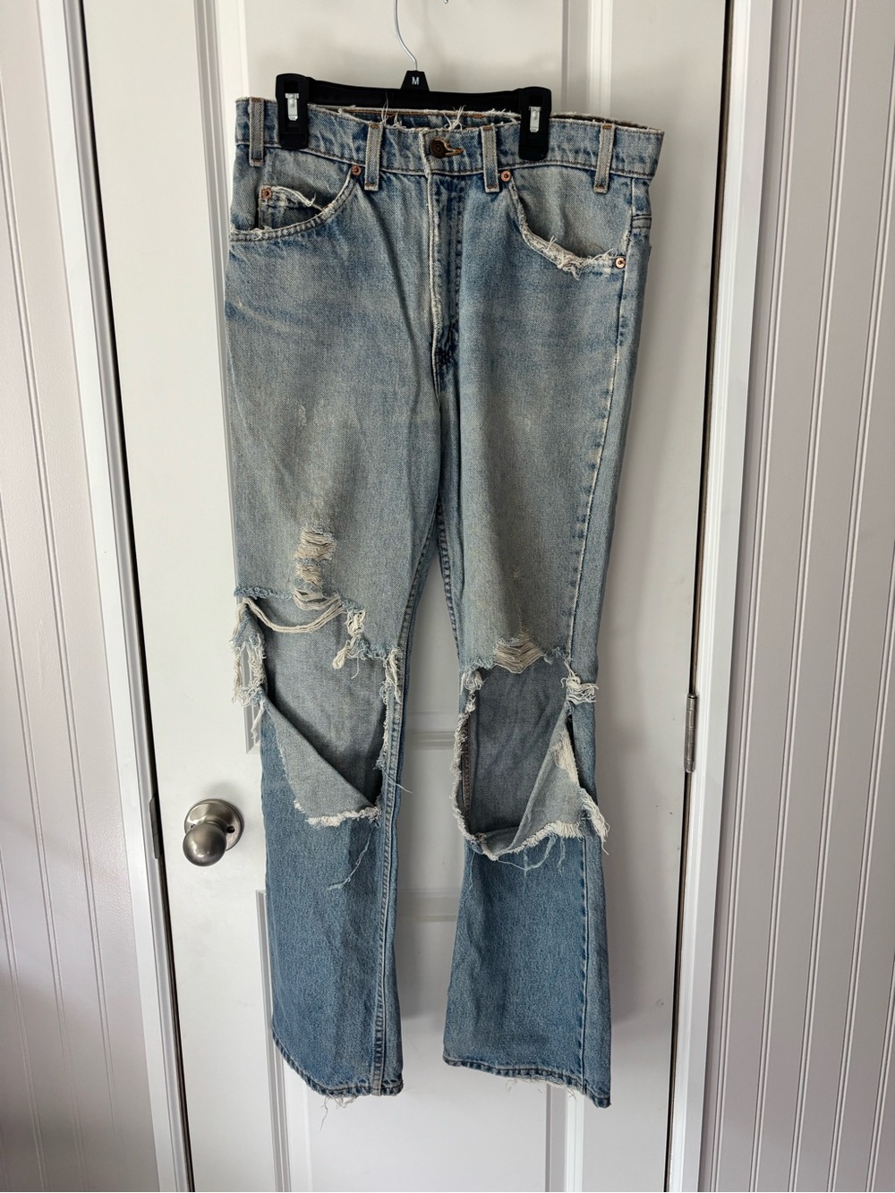 First original orange tag Levi's light blue distressed denim jeans